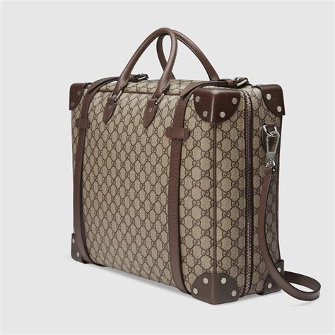 gucci merci|Gucci leather suitcase.